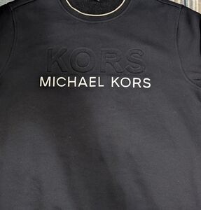 Sleek, black, Michael Kors sweatshirt, men's size med.